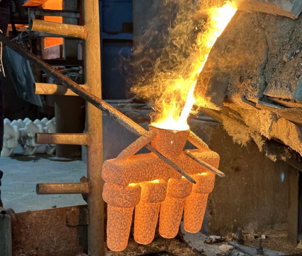 Investment casting pouring